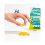 Herbaland-Electrolyte-Gummies-–-Pina-Colada-Flavor-in-Use.jpg